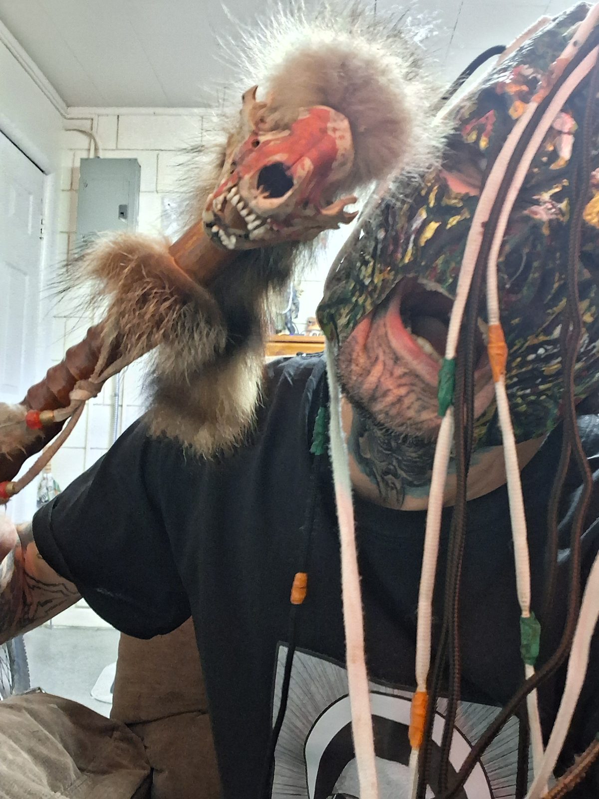 Close photo of the fur-trimmed BoreScum mask and costume